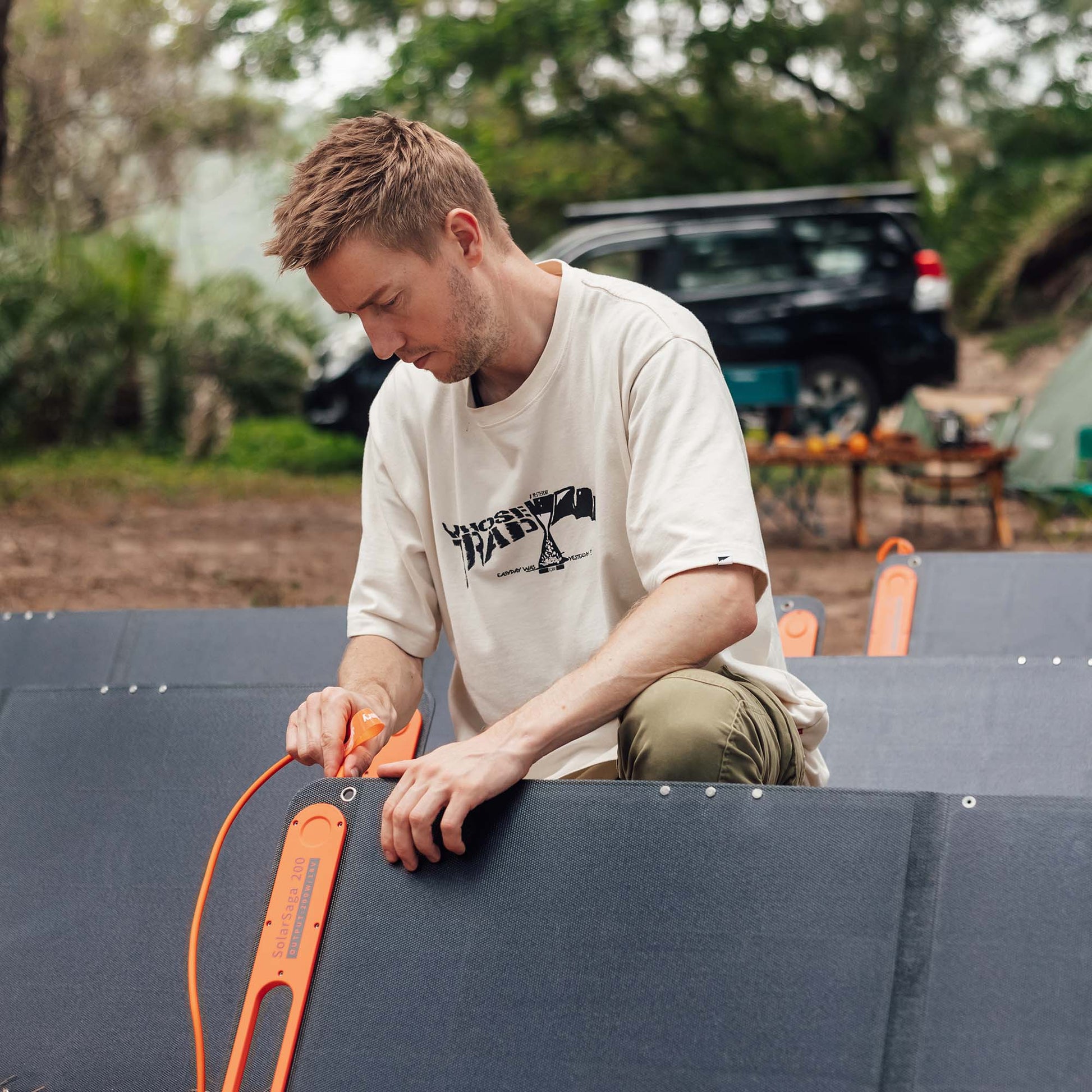 Plugging in cables to Jackery solar panels