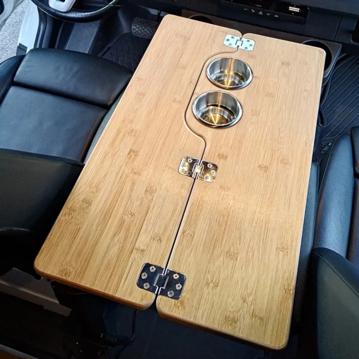Close up of installed bamboo flip table in center console