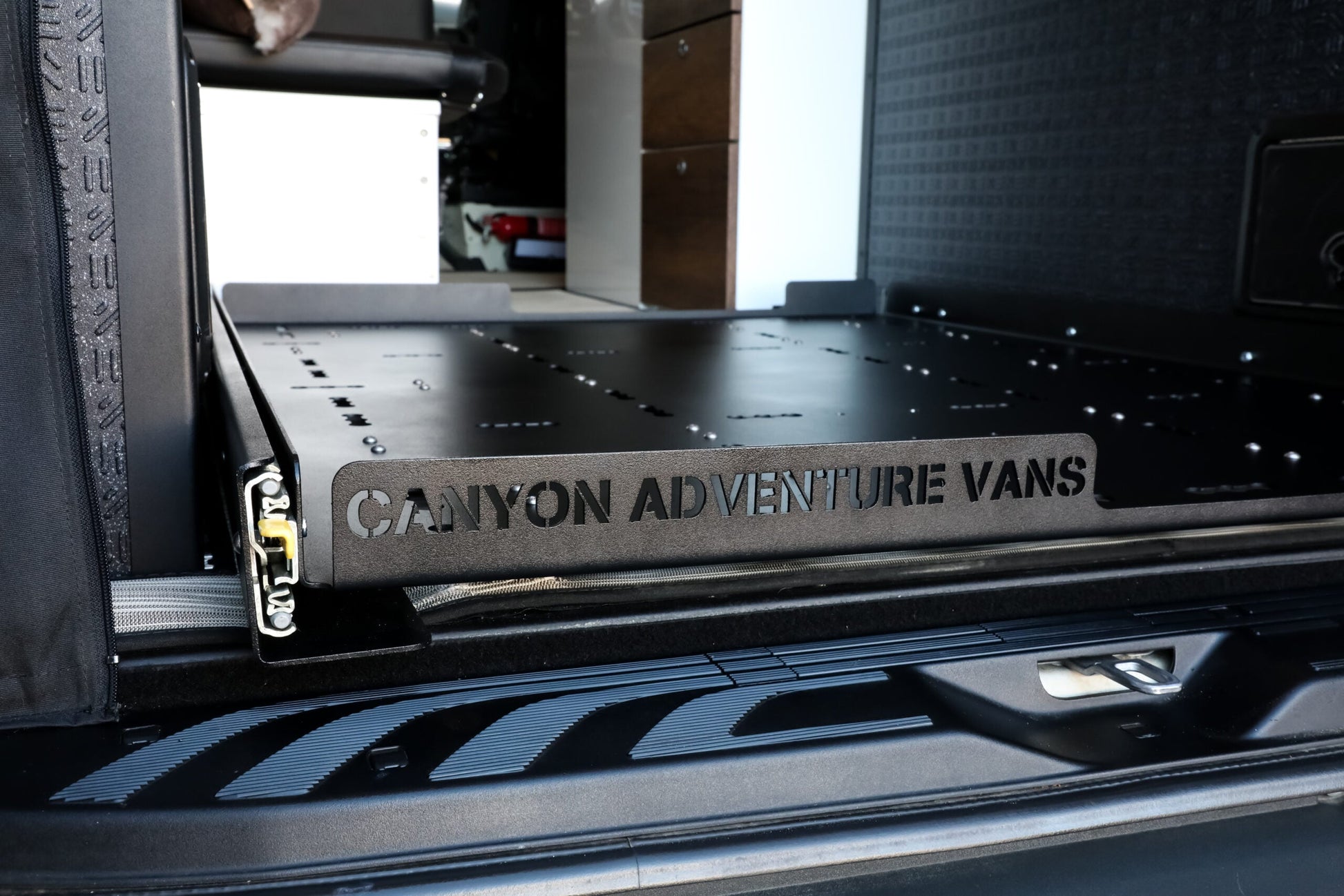 Canyon Adventure Vans storage compartment in a vehicle