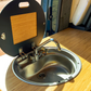 Open view of Grub Lid in sink in van