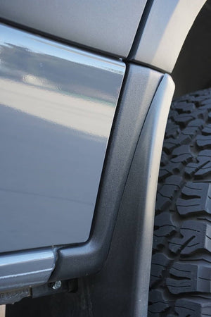 Up Close Photo Of Fender Installed Around Wheel Well