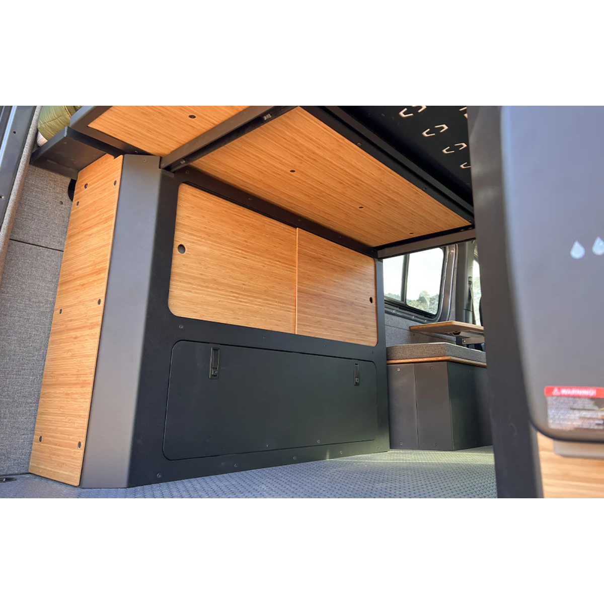 Inside view of Murphy Bed System storage inside a Sprinter van