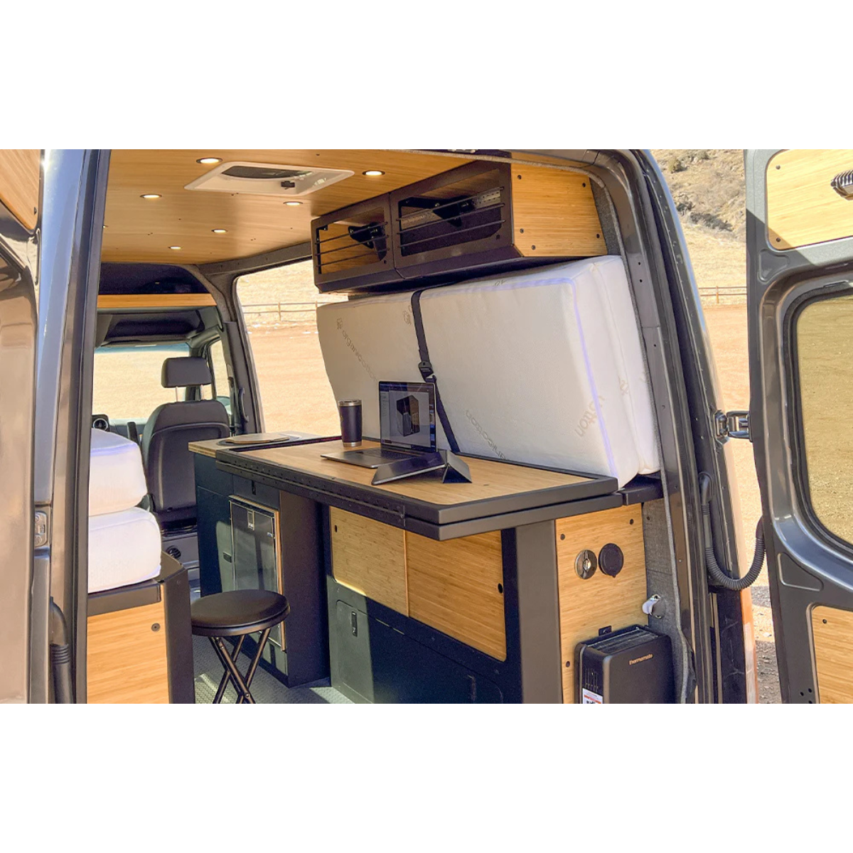 Sprinter 144 with installed Murphy Bed system with bamboo top and workspace set up