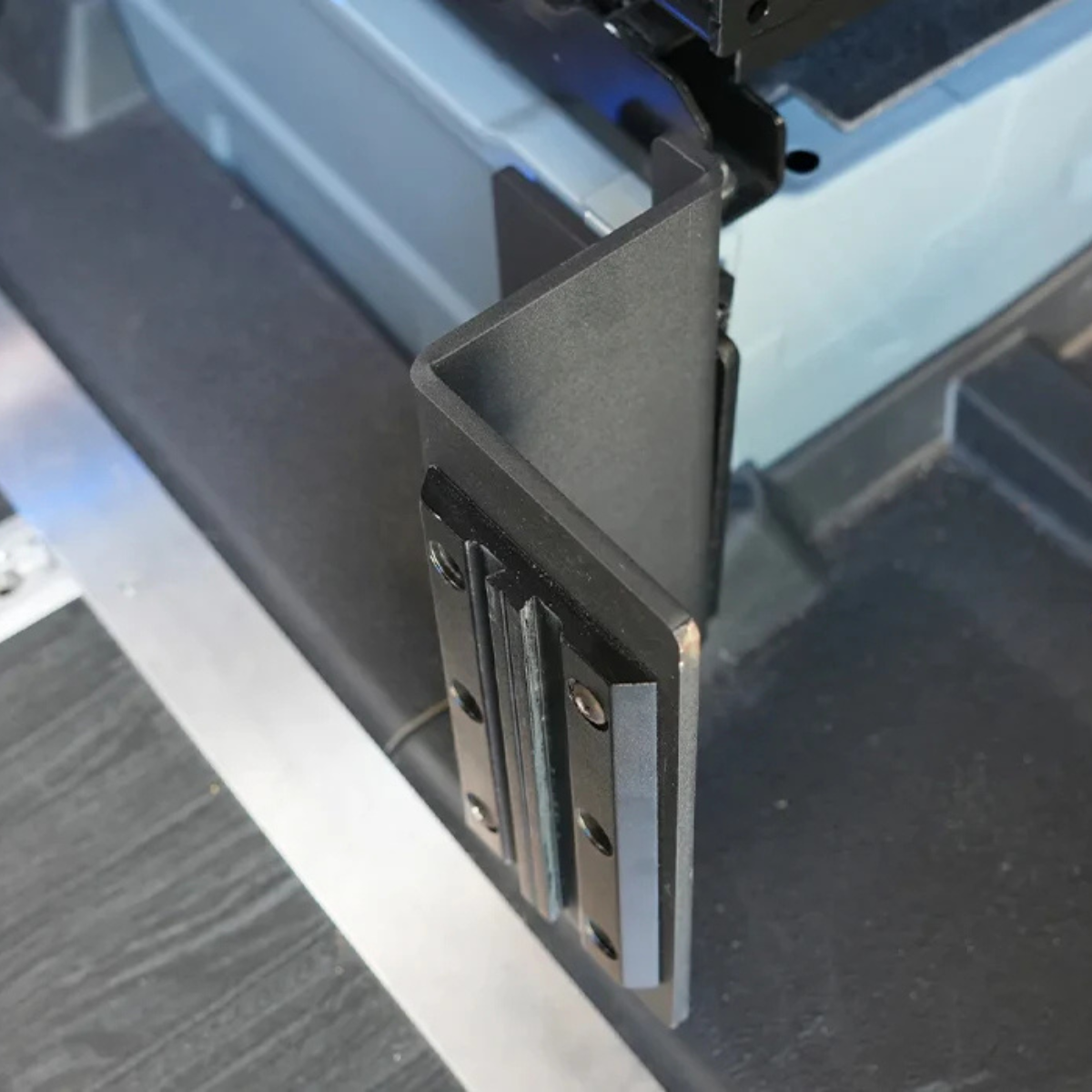 Installed seat base bracket